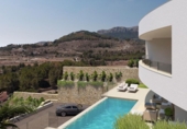 Отдельно стоящий дом с участком на продажу в городе Calpe Фото