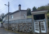 Дом с участком на продажу в городе Castrelo. Фото