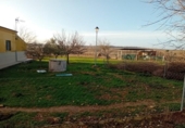 Отдельно стоящий дом с участком на продажу в городе Каррион-де-Калатрава Фото