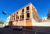 Участок с постройкой на продажу в городе Dénia. Фото