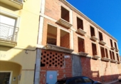 Участок с постройкой на продажу в городе Dénia. Фото