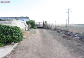 Отдельно стоящий дом с участком на продажу в городе Алькасар-де-Сан-Хуан Фото