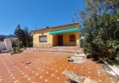 Отдельно стоящий дом с участком на продажу в городе Gandia Фото