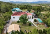 Отдельно стоящий дом с участком на продажу в городе Villar del Arzobispo Фото