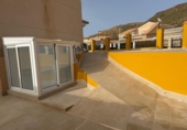 Отдельно стоящий дом с участком на продажу в городе San Juan de los Terreros Фото