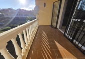 Отдельно стоящий дом с участком на продажу в городе Benalmádena Фото