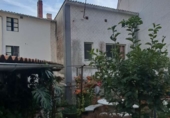 Дом с участком на продажу в городе Sada. Фото
