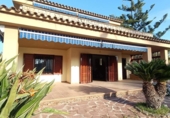 Отдельно стоящий дом с участком на продажу в городе Benicasim Фото