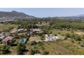 Отдельно стоящий дом с участком на продажу в городе Jávea Фото