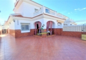 Chalet adosado con terreno en venta en Matalascañas ref: TR411709 foto