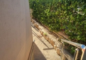 Отдельно стоящий дом с участком на продажу в городе Tortosa. Фото