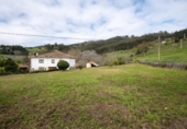 Земля на продажу у города Villaviciosa Фото