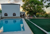 Отдельно стоящий дом с участком на продажу в городе Lucena Фото