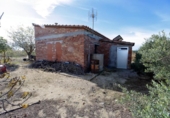 Отдельно стоящий дом с участком на продажу в городе Amposta Фото