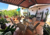Отдельно стоящий дом с участком на продажу в городе Cartaya Фото