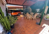 Отдельно стоящий дом с участком на продажу в городе Cartaya Фото