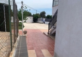 Отдельно стоящий дом с участком на продажу в городе l'Ametlla de Mar Фото