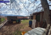 Отдельно стоящий дом с участком на продажу в городе Понферрада Фото