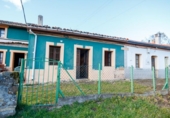 Отдельно стоящий дом с участком на продажу в городе Langreo Фото