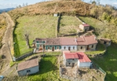 Отдельно стоящий дом с участком на продажу в городе Langreo Фото