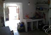 Отдельно стоящий дом с участком на продажу в городе Sedella Фото