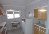 Дом с участком на продажу в городе Baena Фото