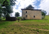 Отдельно стоящий дом с участком на продажу в городе San Martín de Villafufre Фото