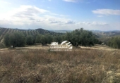 Земля на продажу у города Aguilar de la Frontera Фото
