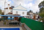 Отдельно стоящий дом с участком на продажу в городе Lucena Фото