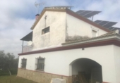 Отдельно стоящий дом с участком на продажу в городе Aznalcázar Фото