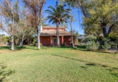 Chalet independiente con terreno en venta en la España, Marchena, ref: TR352230 foto
