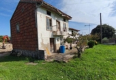 Отдельно стоящий дом с участком на продажу в городе Santa Cruz de Bezana Фото