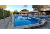 Chalet independiente con terreno en venta en la España, Gerena, ref: TR408248 foto