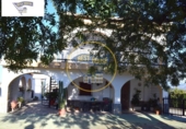 Отдельно стоящий дом с участком на продажу в городе Ontinyent Фото