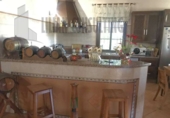 Отдельно стоящий дом с участком на продажу в городе Уэльва Фото