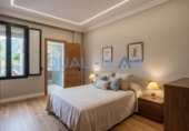 Отдельно стоящий дом с участком на продажу в городе Sant Feliu de Llobregat Фото