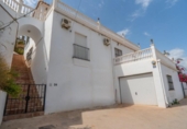 Отдельно стоящий дом с участком на продажу в городе Vélez-Málaga Фото