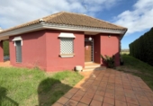 Отдельно стоящий дом с участком на продажу в городе Ayamonte Фото