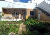 Отдельно стоящий дом с участком на продажу в городе Ciutadella de Menorca Фото
