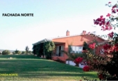 Отдельно стоящий дом с участком на продажу в городе Cartaya Фото