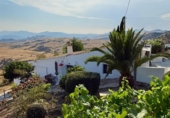 Отдельно стоящий дом с участком на продажу в городе Villanueva de la Concepción Фото