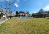 Загородный дом с участком на продажу в городе Antequera Фото