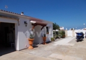 Отдельно стоящий дом с участком на продажу в городе Ciutadella de Menorca Фото