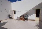 Отдельно стоящий дом с участком на продажу в городе Ciutadella de Menorca Фото