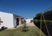 Отдельно стоящий дом с участком на продажу в городе Ciutadella de Menorca Фото