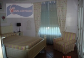 Отдельно стоящий дом с участком на продажу в городе Cartaya Фото