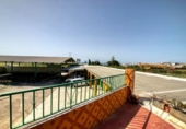 Загородный дом с участком на продажу в городе Torre del Mar Фото
