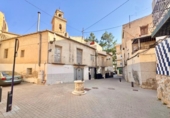 Дом с участком на продажу в городе Orihuela Фото