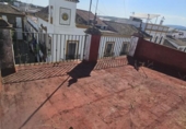 Дом с участком на продажу в городе Villaverde del Río Фото