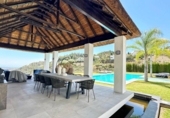 Chalet independiente con terreno en venta en la España, Benahavís, ref: TR164132 foto